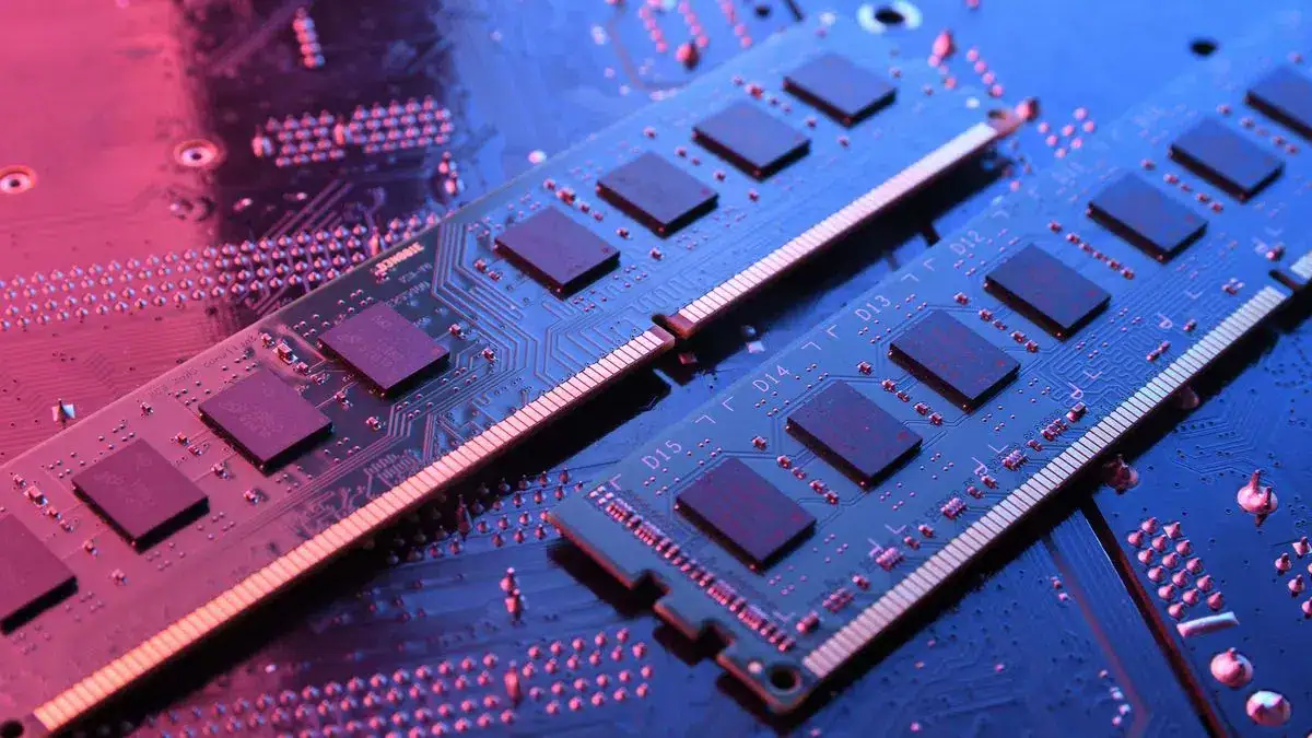 Close-up of laptop RAM modules with circuit details and electronic components.