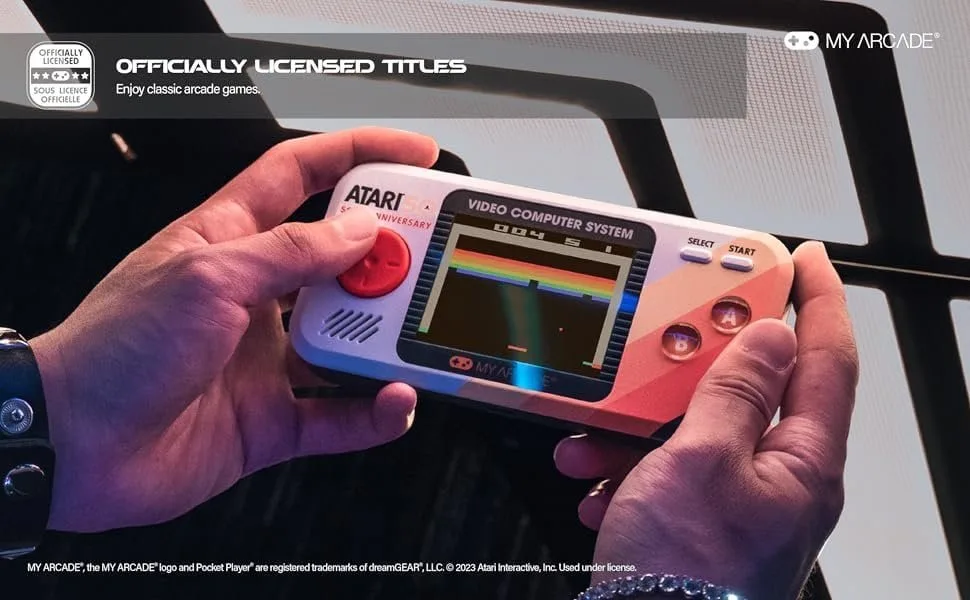 Handheld Atari Pocket Player Pro console with colorful display and classic game controls for gaming.