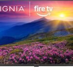 Vibrant mountain sunrise on 4K Ultra HD Fire TV with blooming pink flowers in foreground.