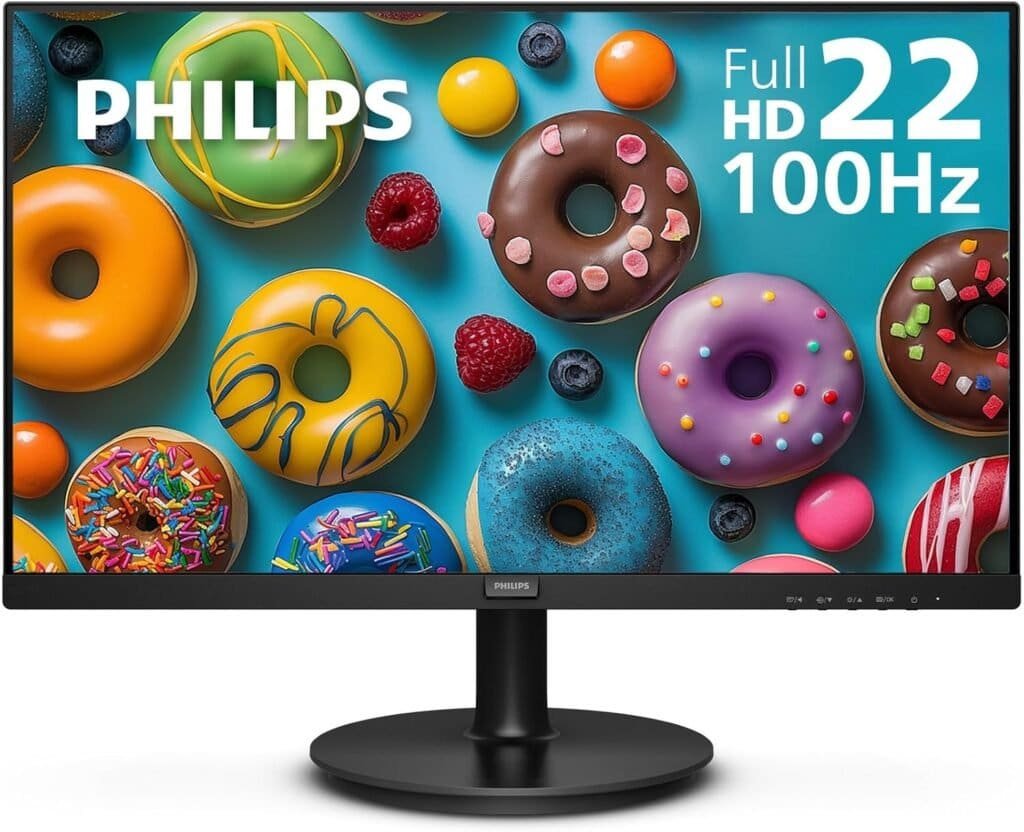 Vibrant image of a Philips computer monitor with colorful donuts and berries, emphasizing high-definition display and vivid colors.