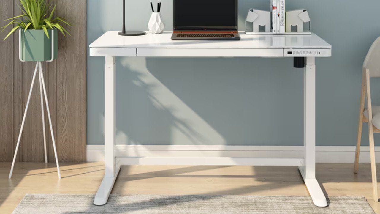 FlexiSpot Comhar all-in-one standing desk under $400 with built-in drawer USB ports for small home office spaces